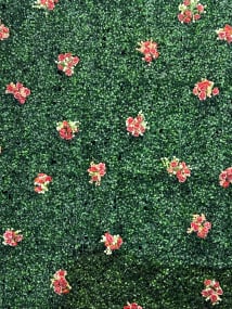 Elegant greenery wall backdrop for weddings and events