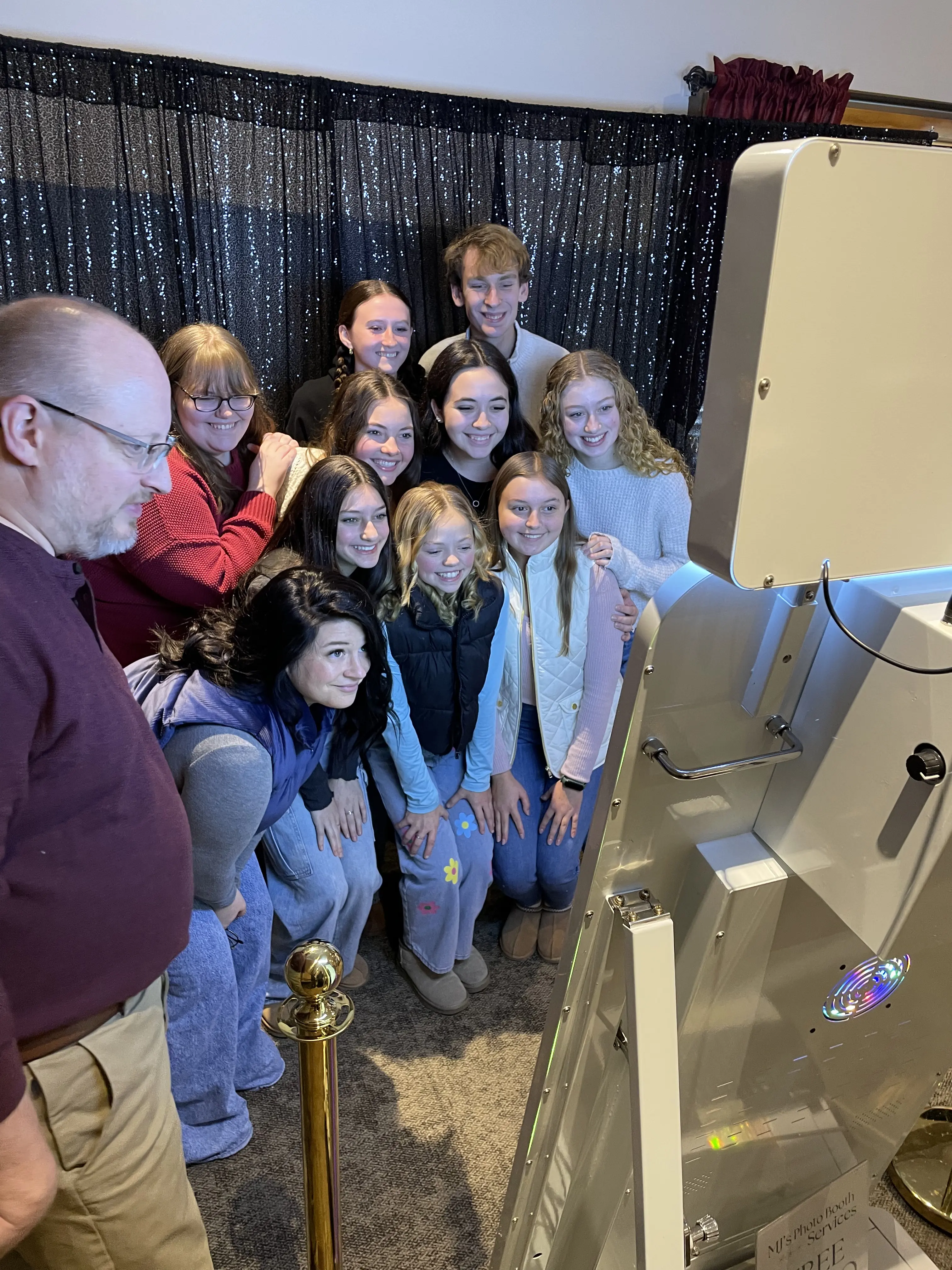 Guests enjoying photo booth rental experience - Mirror Me